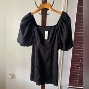 Francesca’s Black Mini Dress. New With Tags. Size S best fits Size 4.